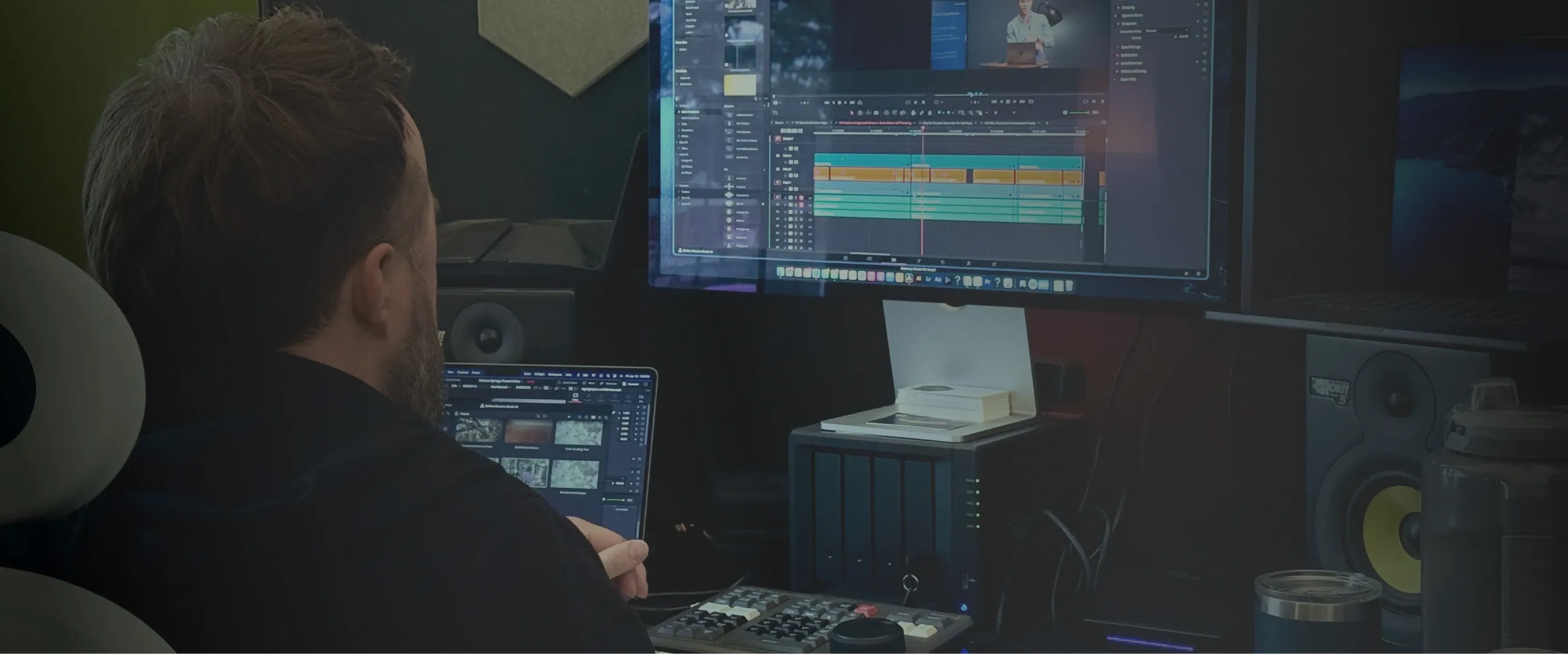 Video editing displayed on a large monitor
